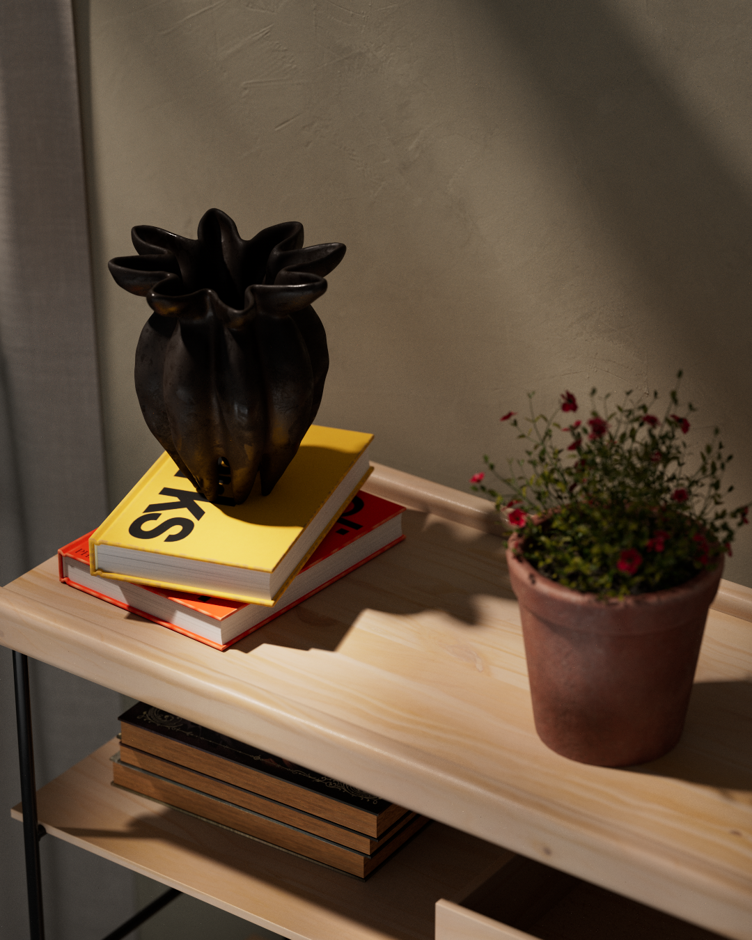 Lotus · on a shelf with books